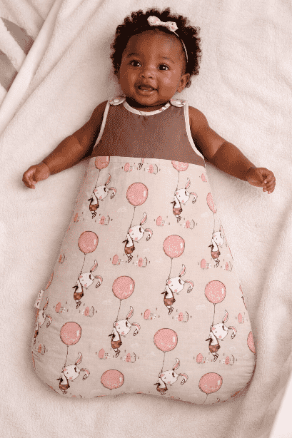 Illustrated image of a baby in a winter sleep sack